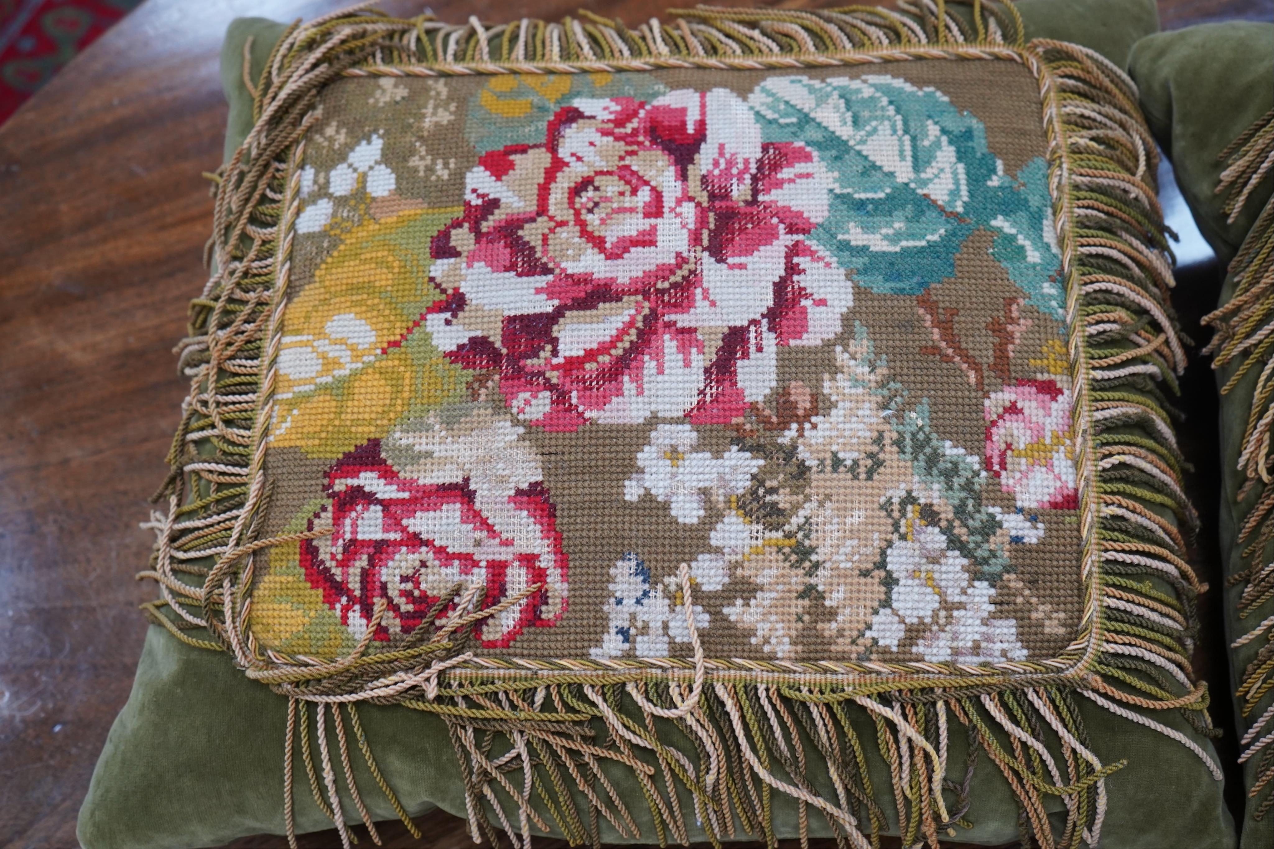 Seven 19th century cushions. Three Aubusson tapestry cushions and two machine Aubusson cushions, together with two floral wool worked cushions, all with decorative fringing. Largest 40cm x 45cm. condition - three are wor